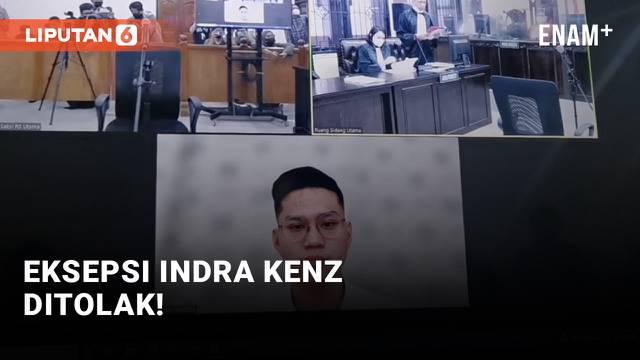 Selebritas Indra Kenz hadir secara online dalam pembacaan tanggapan jaksa penuntut umum atas eksepsi yang diajukan kuasa hukumnya. Eksepsi terdakwa Indra Kenz ditolak jaksa penuntut umum karena dakwaan dinilai sudah memenuhi syarat.