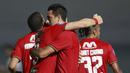 Bek Persija Jakarta, Otavio Dutra (tengah) melakukan selebrasi bersama rekan setim usai mencetak gol ke gawang PSIS Semarang dalam laga pekan kedua BRI Liga 1 2021/2022 di Indomilk Arena, Tangerang, Minggu (12/9/2021). (Foto: Bola.Com/M. Iqbal Ichsan)
