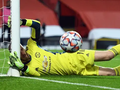 David De Gea bergabung dengan Manchester United sejak musim 2011/2012 lalu. Kesuksesannya bersama Setan Merah terbukti dari satu gelar Premier League, satu Piala FA, dan dua gelar Liga Europa. (Foto: AFP/Oli Scarff)