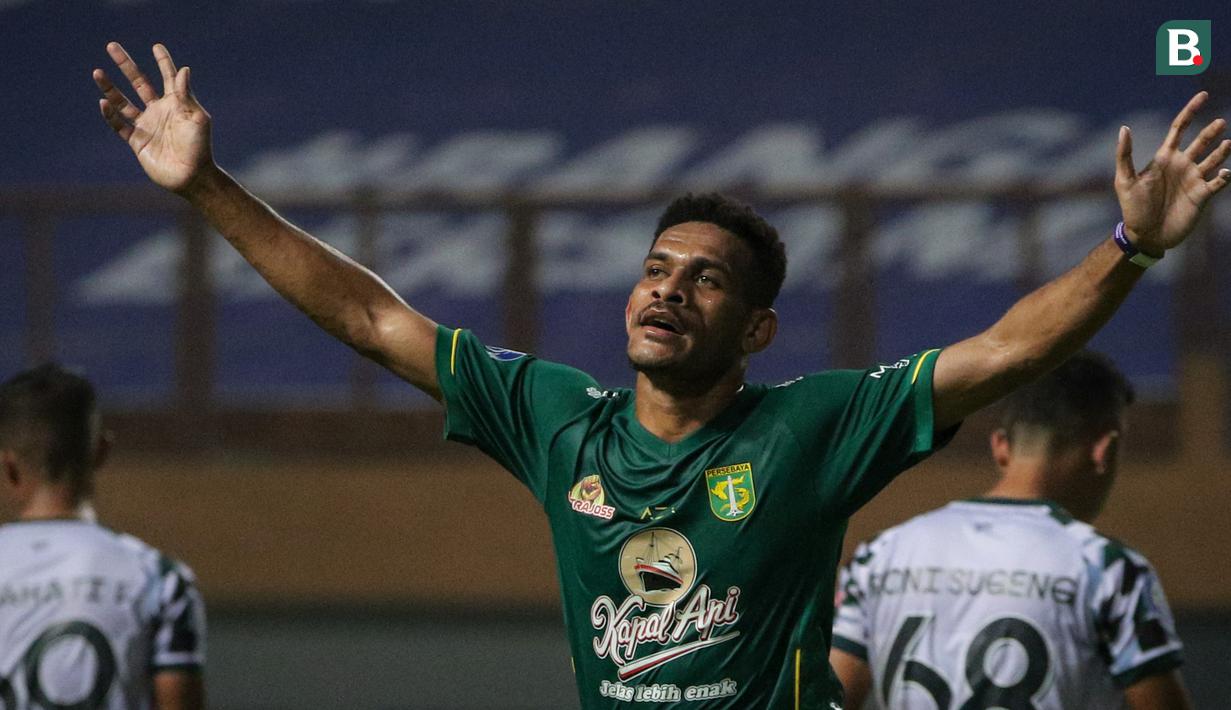 Gelandang Persebaya, Ricky Kambuaya merayakan gol kedua timnya saat melawan Persikabo 1973 dalam laga pekan kedua BRI Liga 1 2021/2022 di Stadion Wibawa Mukti, Cikarang, Sabtu (11/09/2021). Persebaya menang 3-1. (Foto: Bola.com/Bagaskara Lazuardi)