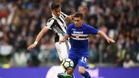 Juventus meraih kemenangan tiga gol tanpa balas atas Sampdoria pada laga pekan ke-32 Serie A di Allianz Stadium, Minggu (15/4/2018). (AFP/MARCO BERTORELLO)