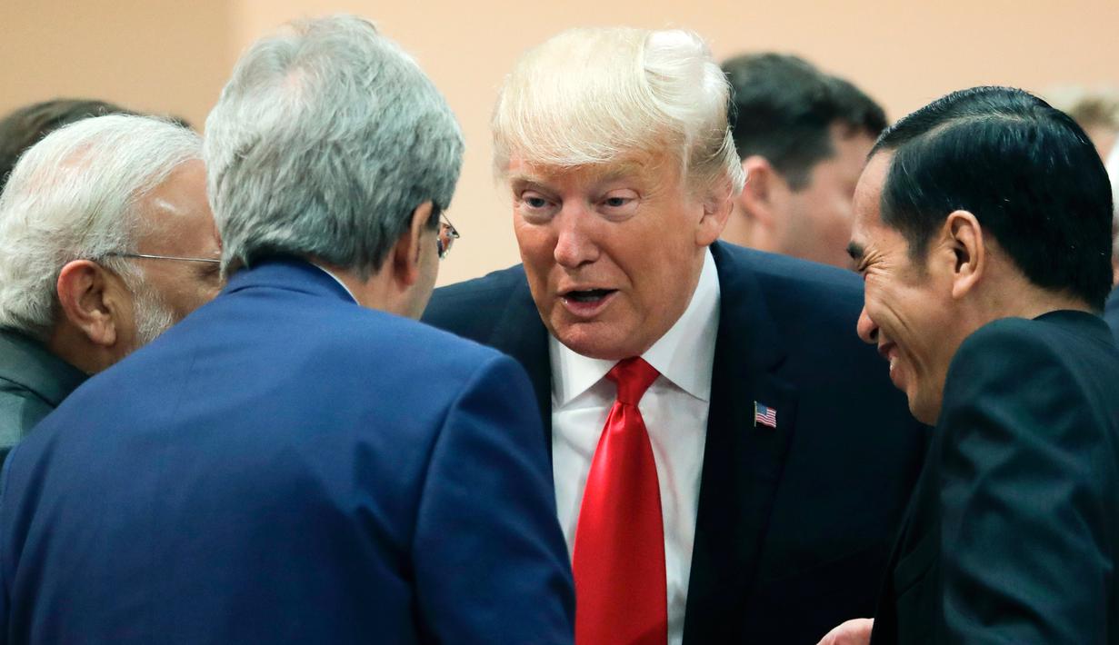 Tawa Lepas Jokowi dan Donald Trump di KTT G20 - Foto Liputan6.com