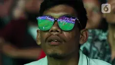 Warga saat nonton bareng pertandingan Timnas Indonesia melawan Irak pada pertandingan perebutan tempat ketiga Piala Asia U-23 Qatar 2024, Monumen Nasional, Jakarta, Kamis (2/5/2024). (Liputan6.com/Herman Zakharia)