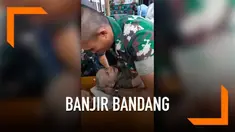 Badan bayi berusia lima bulan korban banjir Sentani terjepit kayu selama enam jam, beruntung prajurit TNI berhasil menyelamatkannya.