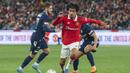 <p>Pemain Manchester United, Zidane Iqbal saat menghadapi Melbourne Victory dalam laga pramusim 2022/2023 di Melbourne Cricket Ground, Australia, Jumat (15/7/2022). (AP/Asanka Brendon Ratnayake)</p>