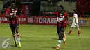 Penyerang Persipura James Koko Lomell berlari usai mencetak gol ke gawang Persija di laga Torabika Soccer Championship presented by IM3 Ooredoo di Stadion Mandala Jayapura, Papua, Jumat(29/4/2016). Laga imbang 1-1. (Liputan6.com/Helmi Fithriansyah)