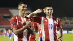 Tiga gol kemenangan Paraguay yang telah dipastikan gagal ke Piala Dunia 2022 dicetak oleh Robert Morales di menit ke-10, gol bunuh diri bek Ekuador Piero Hincapie di injury time babak pertama dan Miguel Almiron di menit ke-54. (AP/Jorge Saenz)