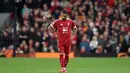 Di sisi lain, kalah dari Manchester United membuat posisi Liverpool tertahan di peringkat keempat klasemen dengan 15 poin atau tertinggal empat angka dari Arsenal yang berada di puncak klasemen. (PETER POWELL/AFP)