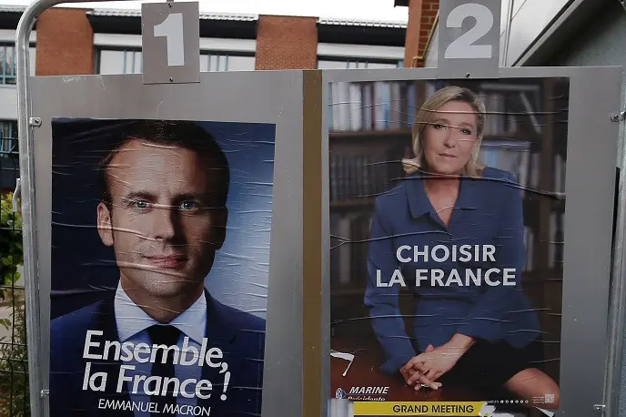 Emmanuel Macron dan Marine Le Pen (AP)