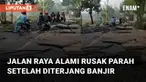 Sebuah jalan raya alami rusak parah setelah diterjang banjir mengundang perhatian