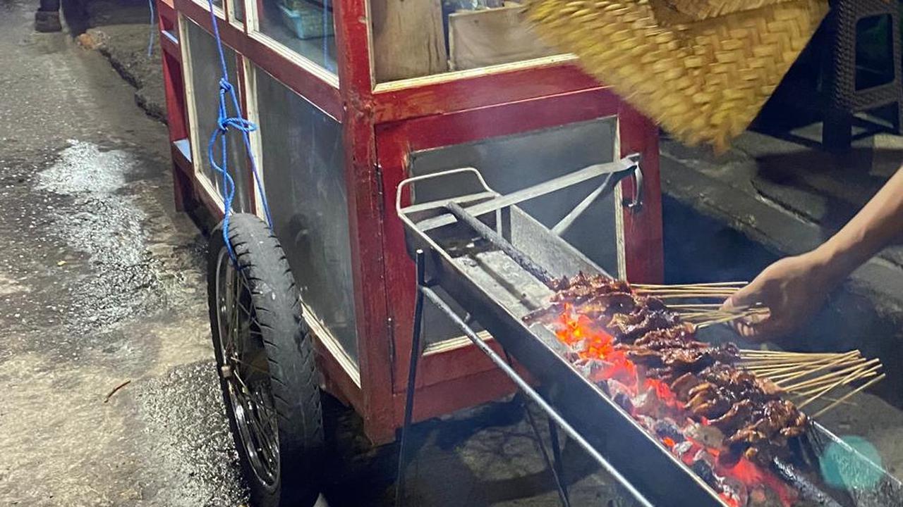 Ilustrasi Penjual Sate