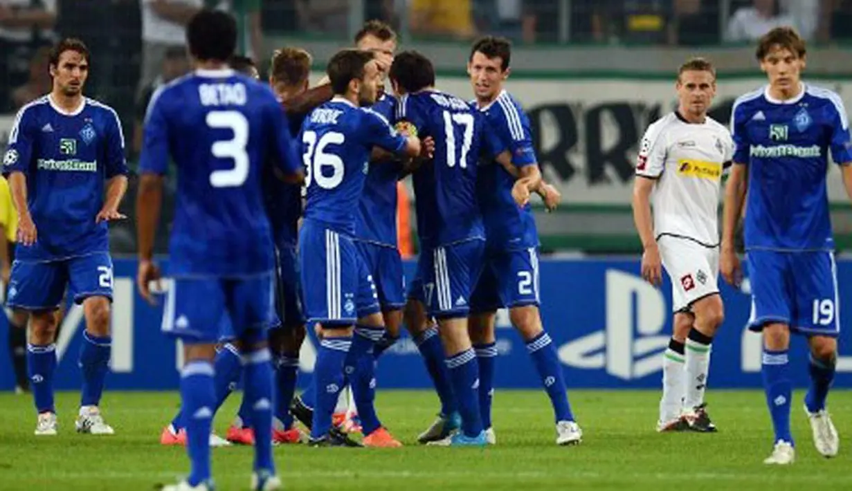 Liputanchampions,Jerman: Pemain Kiev lakukan selebrasi setelah mencetak gol dalam leg pertama babak Play Off Liga Champions pada 21 Agustus 2012 di Moenchengladbach, Jerman barat. AFP PHOTO / Patrik STOLLARZ