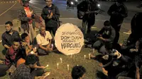 Aksi yang digelar di depan Balaikota Solo. (Liputan6.com/Reza Kuncoro)