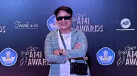 Melangkah ke karpet merah AMI Awards 2023, penyanyi Megi Andika berbagi cerita soal kesibukan terbaru yakni mempersiapkan mini album yang segera rilis. (Foto: Dok. Koleksi Pribadi Megi Andika)