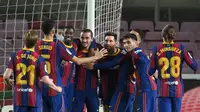 Barcelona meraih kemenangan 4-1 atas Huesca pada laga pekan ke-27 La Liga di Camp Nou, Selasa (16/3/2021) dini hari WIB. Dua dari empat gol Barca disarangkan Lionel Messi. (AFP/Lluis Gene)