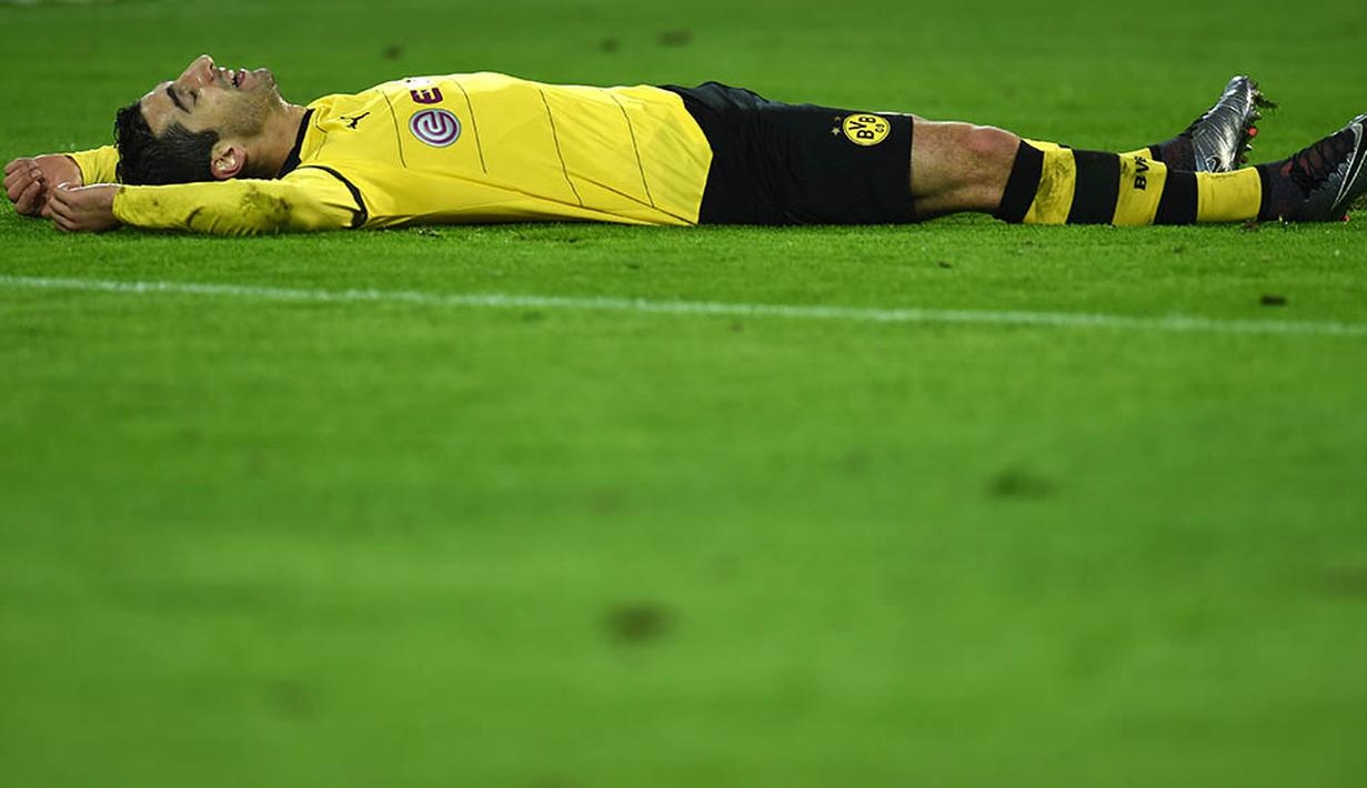 2. Henrikh Mkhitaryan, mantan gelandang Donetsk ini penampilannya kurang memuaskan ketika Dortmund dilatih Klopp. Namun musim ini saat Dortmund dilatih Thomas Tuchel, dirinya bersinar dengan menorehkan 9 gol serta 10 assist. (AFP/Patrik Stollarz)