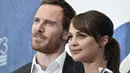 Aktor Michael Fassbender dan Alicia Vikander telah resmi menikah, dan kabar ini telah dikonfirmasi oleh seorang sumber pada PEOPLE. Resor mewah, La Granja, menjadi venue pernikahan mereka. (AFP/Tiziana Fabi)