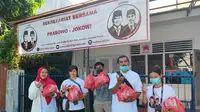Ringankan Beban Ekonomi Masyarakat, Sekber Prabowo-Jokowi Gelar Bakti Sosial. (Liputan6.com/Ist)