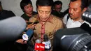 Mantan Menteri Luar Negeri Hassan Wirajuda memberikan keterangan kepada pers usai bersaksi di sidang perkara dengan terdakwa Sudjadnan Parnohadiningrat di Pengadilan Tipikor, Rabu (28/5/14). (Liputan6.com/Miftahul Hayat)