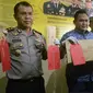 Kapolres Malang Kota, AKBP Hoiruddin Hasibuan menunjukkan bukti pungli pejabat BPN (Zainul Arifin/Liputan6.com)