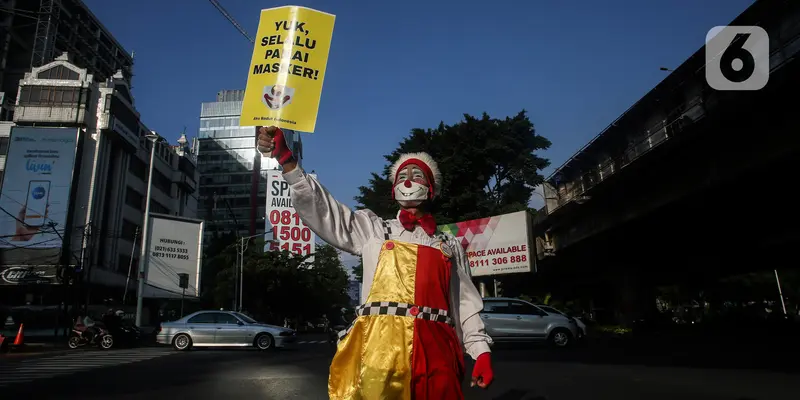 Aksi Badut Indonesia Kampanyekan Penggunaan Masker