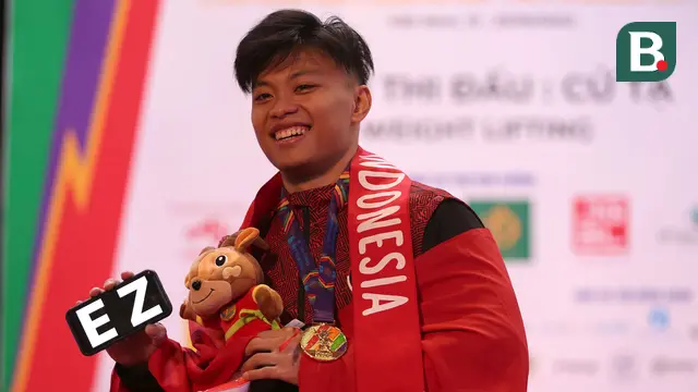 Foto: Tampil Percaya Diri, Rahmat Erwin Abdullah Rebut Emas Angkat Besi di Kelas 73 kg Putra sekaligus Pecahkan Rekor SEA Games