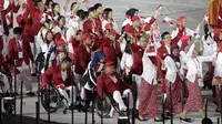 Kontingen Indonesia saat pembukaan Asian Para Games di SUGBK, Jakarta, Sabtu (06/10/2018). Pembukaan dimeriahkan para penyandang disabilitas. (Bola.com/M Iqbal Ichsan)