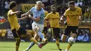 Erling Haaland kembali mencetak gol kala Manchester City bertandang ke markas Wolverhampton dalam pekan ketujuh Premier League 2022/2023, Sabtu (17/9/2022). Haaland mencetak satu gol dan mencatatkan rekok baru di Liga Inggris. (AP Photo/Rui Vieira)