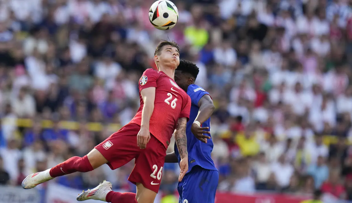 Timnas Prancis harus puas imbang 1-1 melawan Polandia. (AP Photo/Hassan Ammar)