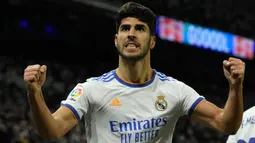 Rekan Benzema, Marco Asensio juga berhasil menorehkan namanya di daftar pencetak hattrick Liga Spanyol pada musim ini. Asensio melakukan hal tersebut saat Real Madrid pesta 6-1 ke gawang Real Mallorca pada pekan keenam. (AFP/Oscar Del Pozo)