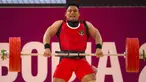 Lifter Indonesia, Muhammad Zul Ilmi berkompetisi pada nomor angkat besi putra 89kg SEA Games 2023 di Hanoi Sports Training and Competition Center, Hanoi, Vietnam, Minggu (22/5/2022). Zul meraih medali perak setelah melakukan total angkatan 328kg (145kg snatch dan 183kg clean & jerk). (AP Photo/Tatan Syuflana)
