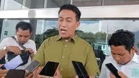 Anggota DPRD Poso, Muhammad Yusuf di Gedung Kejati Sulteng, menjelaskan perihal laporan dugaan suap di DPRD Poso, Kamis (18/8/2022). (Foto: Heri Susanto/ Liputan6.com).