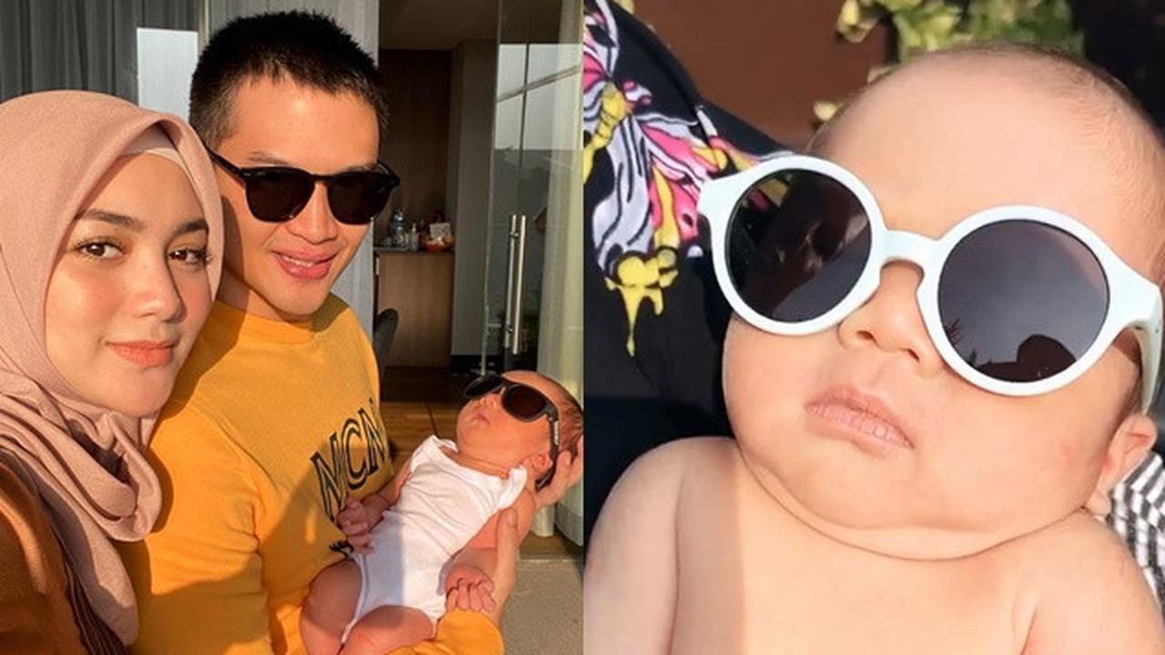 6 Potret Baby Keene Atharrazka Berjemur Pakai Kacamata, Bikin Gemas