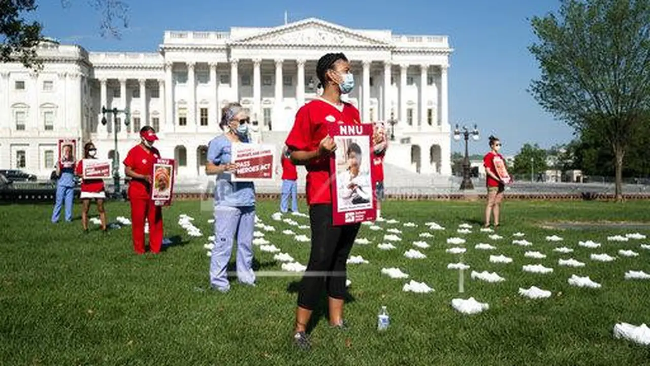 NATIONAL NURSES UNITED (Bill Clark/AP Images)