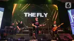 Grup musik The Fly saat tampil pada hari kedua festival musik All You Can Hear Gigs di Asthana Kemang, Jakarta Selatan, Rabu (6/11/2024). (Liputan6.com/Angga Yuniar)