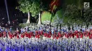Atlet kontingen Indonesia memasuki stadion pada pembukaan Asian Games 2018 di Stadion Utama Gelora Bung Karno (SUGBK), Jakarta, Sabtu (18/8). Kontingen Indonesia mendapat sambutan meriah penonton yang hadir. (Liputan6.com/Ferbian Pradolo)