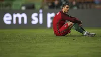 Ekspresi Cristiano Ronaldo setelah Portugal takluk 0-1 melawan Albania pada laga persahabatan, Jumat (25/3/2016). (EPA/Paulo Cunha)