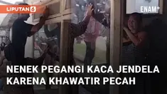 Nenek dibantu warga sekitar menahan kaca jendela rumahnya yang bergetar. Kaca ditahan agar tidak pecah saat truk sound horeg melintas