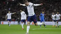 Striker timnas Inggris, Jamie Vardy, merayakan gol yang dicetaknya ke gawang Italia dalam laga uji coba di Stadion Wembley, Rabu (28/3/2018) dini hari WIB.  (AP Photo/Kirsty Wigglesworth)