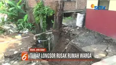 Rumah warga rusak tertimpa turap 15 meter yang longsor akibat hujan deras.