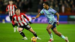 Bermain tandang, Arsenal menang 3-1 atas Brentford. (JUSTIN TALLIS/AFP)