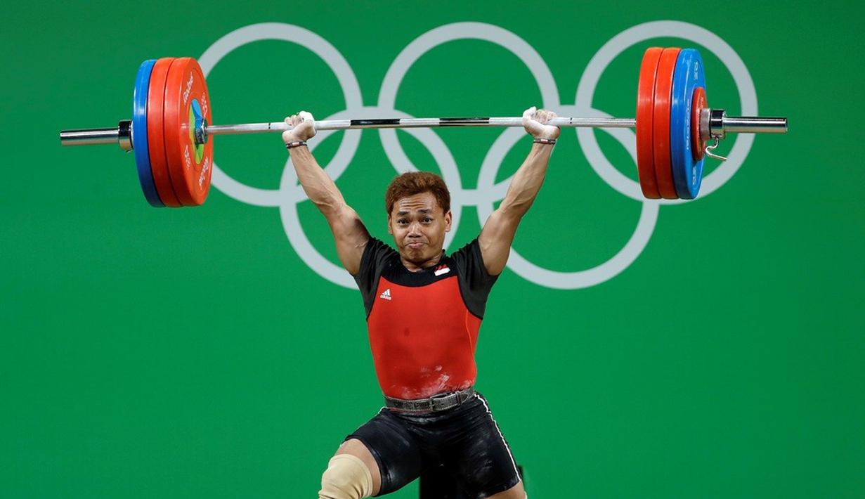 Eko Yuli Irawan memulai Snatch dengan angkatan 142 kg. Dia dengan mudah menaklukkan angkatan pada kesempatan pertama ini. (AP Photo/Mike Groll)