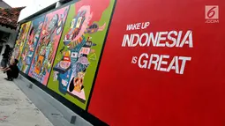 Suasana di pameran street art atau yang biasa di kenal dengan sebutan Mural karya senimanYogyakarta yang bertajuk INDONESIA IS GREAT di museum Galeri Nasional, Jakarta, Sabtu (22/7). (Liputan6.com/Helmi Afandi)