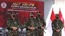 Kapolri Jenderal Pol Listyo Sigit Prabowo (kedua kiri) didamping Wakapolri Komjen Pol Gatot Eddy Pramono (kiri), memberikan keterangan pers pada peringatan HUT ke-76 Korps Brimob Polri di Mako Brimob, Kelapa Dua, Depok, Jawa Barat, Minggu (14/11/2021). (Liputan6.com/Herman Zakharia)