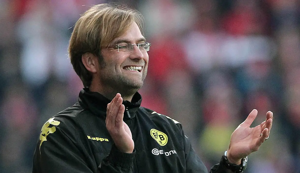Juergen Klopp merupakan salah satu pelatih legendaris di Dortmund. Berkat sejumlah prestasi yang pernah dirinya raih selama tujuh musim menukangi Die Borussen. (AFP/Daniel Roland)