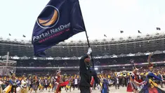 Ribuan simpatisan saat mengikuti apel siaga perubahan Partai NasDem di GBK, Senayan, Jakarta, Minggu (16/7/2023). (Liputan6.com/Angga Yuniar)