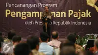 Presiden Jokowi memberikan arahan dalam pencanangan program kebijakan pengampunan pajak atau tax amnesty. (Liputan6.com/Faizal Fanani)
