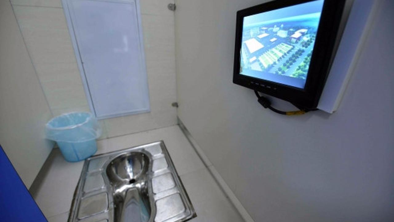 Fasilitas mewah di toilet umum Beijing ini bikin betah BAB
