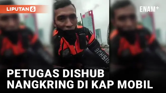 Viral Petugas Dishub Nangkring di Atas Kap Mobil