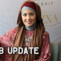 Risty Tagor sedang menikmati kesendiriannya dengan mengasuh kedua anak laki-lakinya.